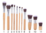 11 bamboo handles, makeup brush, tool set, linen bag, blush brush, foundation brush, and a full set of makeup.